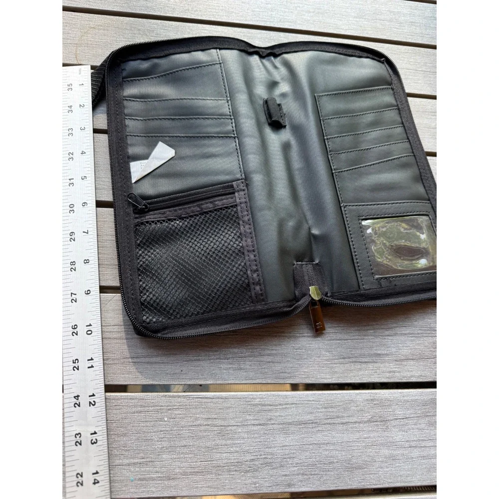 American Tourister travel organizer detachable wrist strap secure doc storage